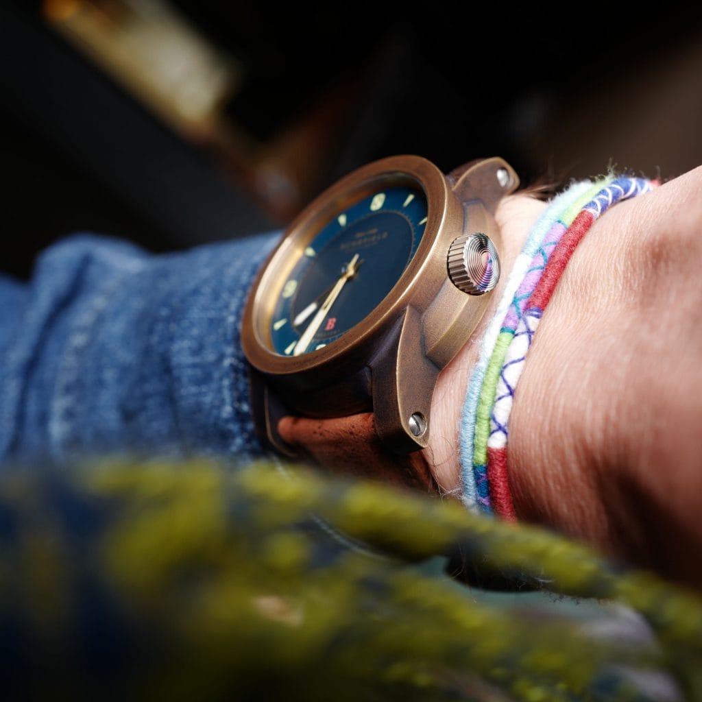 Bronze beater watch on wrist