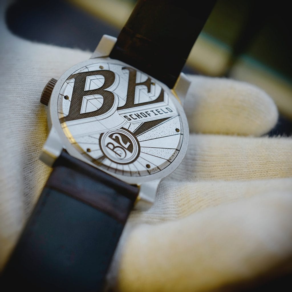 Case back of Beater B2 in white glove