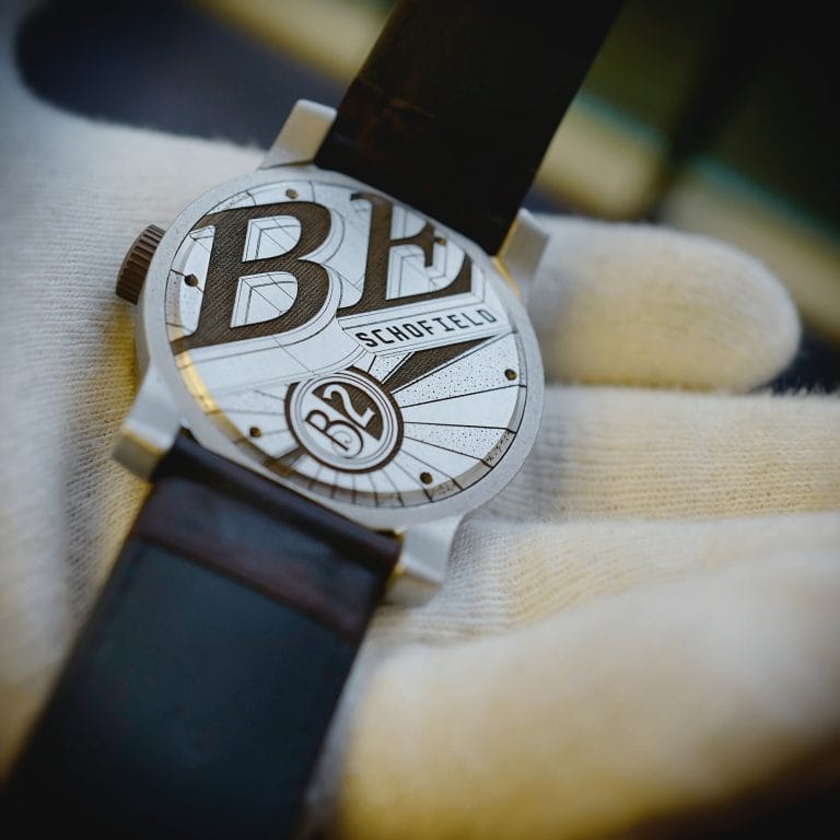 Case back of Beater B2 in white glove