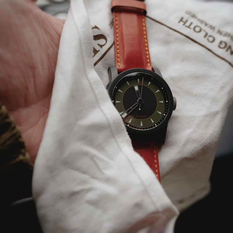 Daymark Dark on tomato red Schofield and Cudd strap