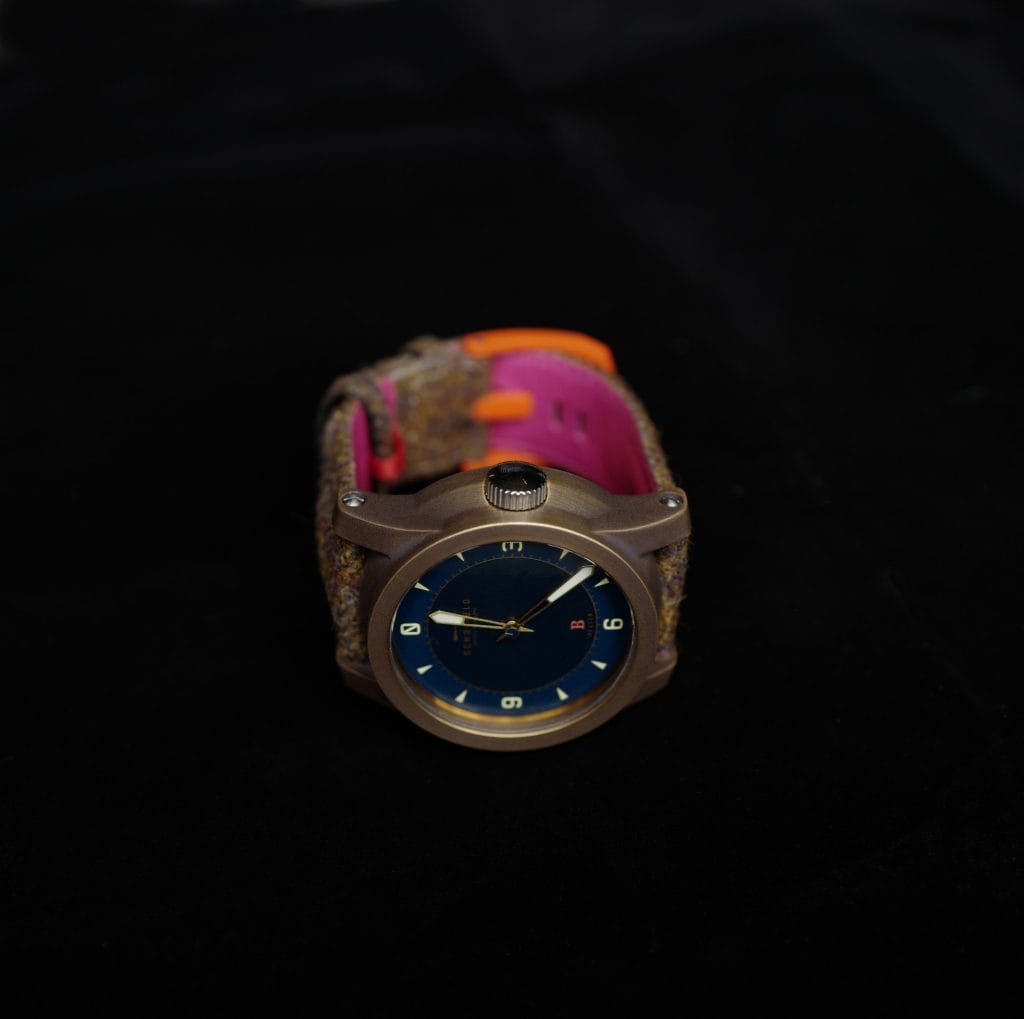 Patinated Bronze Beater with orange buckle