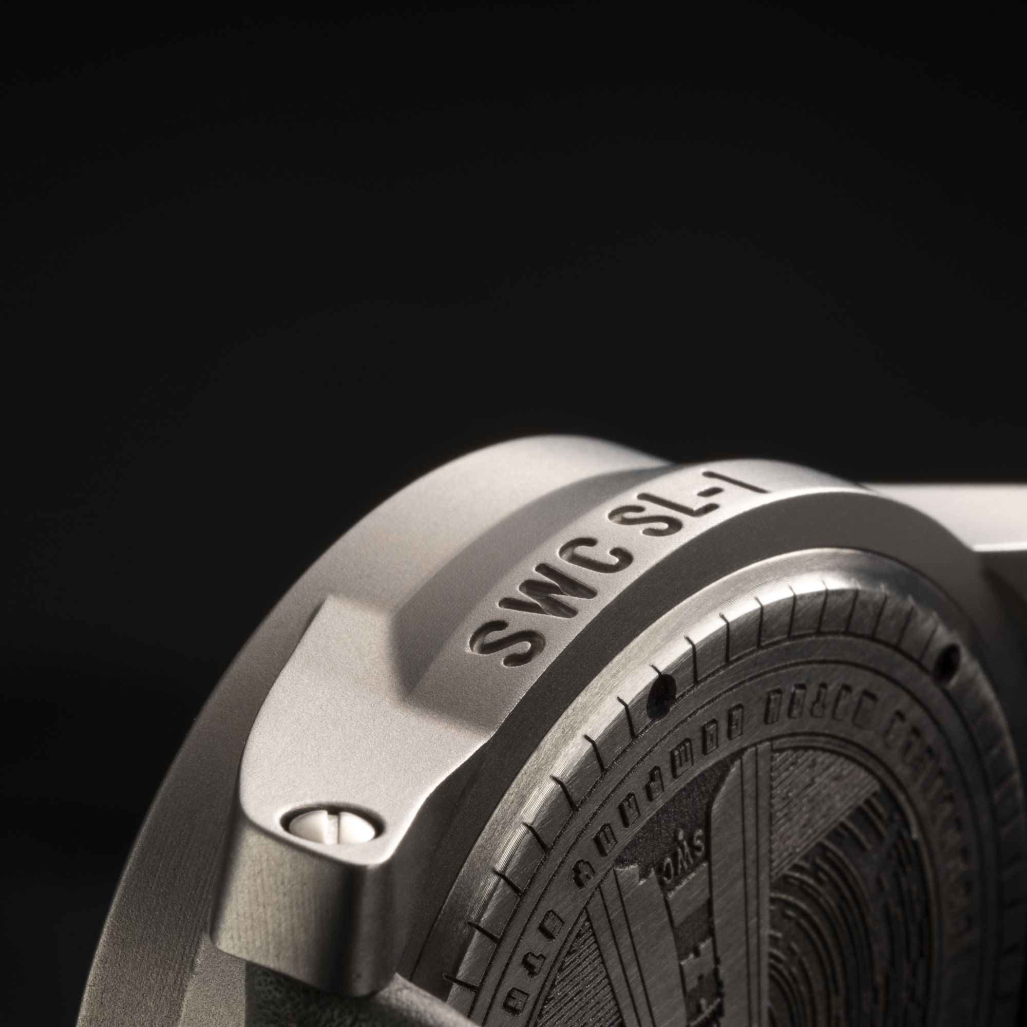 Titanium watch case engraving