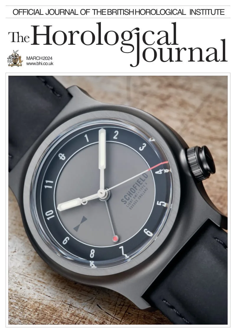 Cover of The Horological Journal, March 2024 issue, featuring a close-up of a Schofield Light wristwatch with a black leather strap and a grey dial. The watch displays both 24-hour and 12-hour time formats in a sleek, modern design. Schofield in the HOROLOGICAL JOURNAL appears prominently along with the journal title.