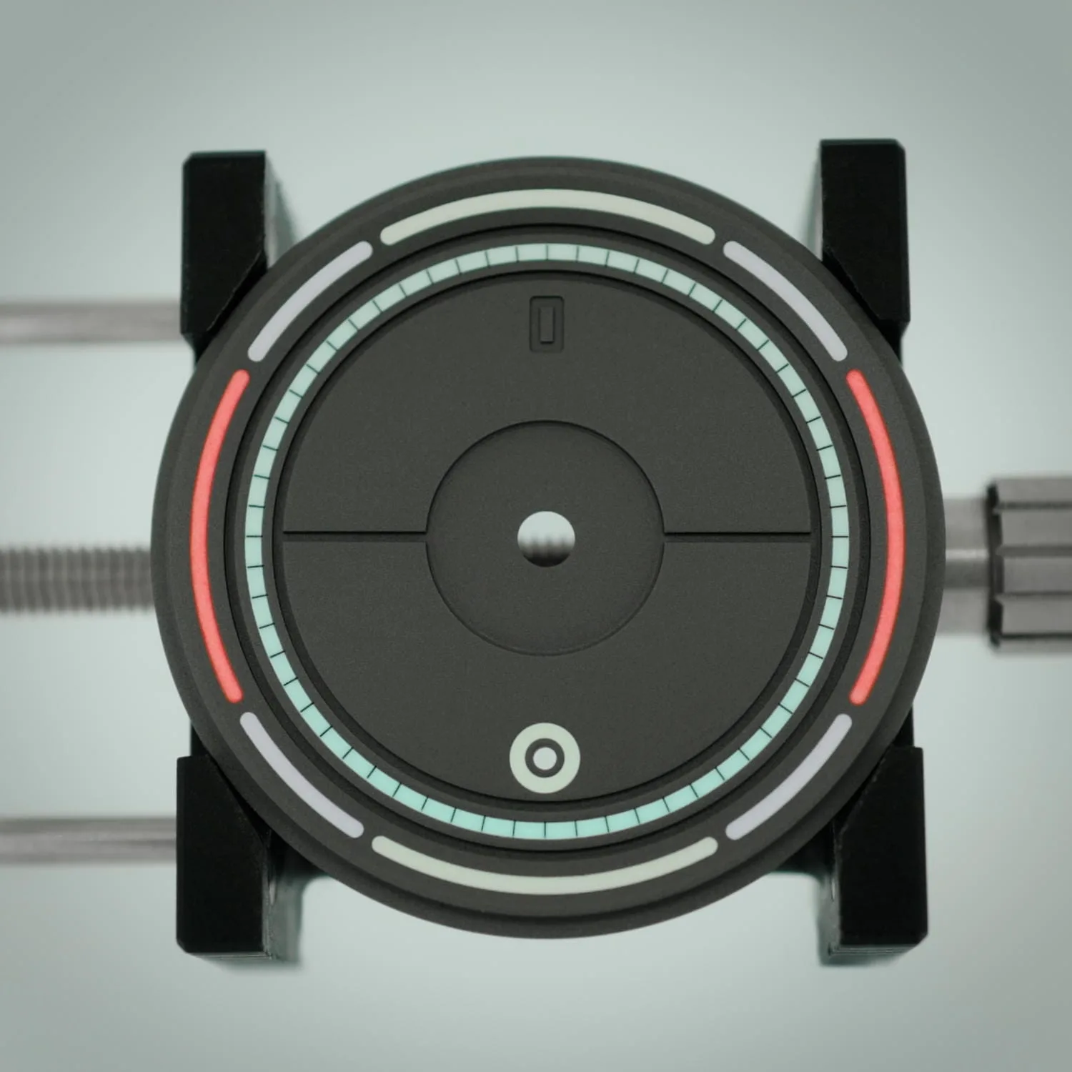 Close-up of a brilliant black circular watch dial with rings or Super-LumiNova. The Obscura dial by Schofield is shown as a close-up.