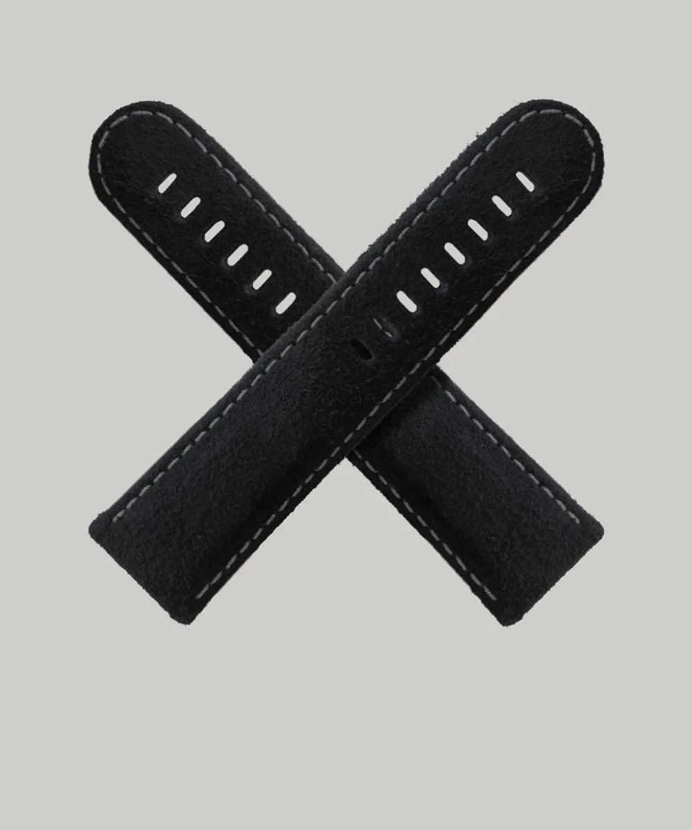 Two Rough-Out Suede watch straps crossed over each other in the shape of an "X" against a plain, light grey background. The straps have white stitching along the edges and multiple holes for adjustment.