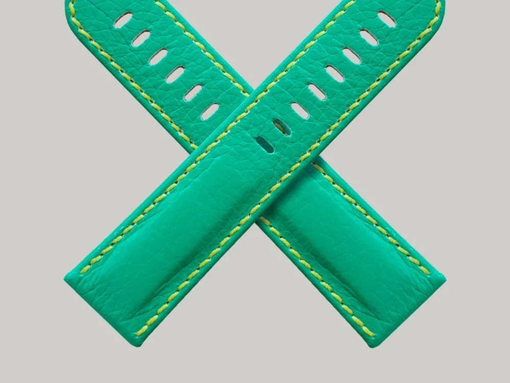 Neon Green watch band. Shown in an X these high end watch straps are very bright leather with yellow stitching.