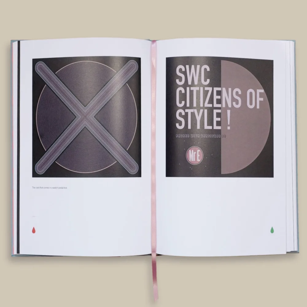 An open hard cover book with a pink ribbon bookmark in the centre. The left page displays a geometric design resembling an "X". The right page features the text "SWC CITIZENS OF STYLE!" with "Mr E" at the bottom.