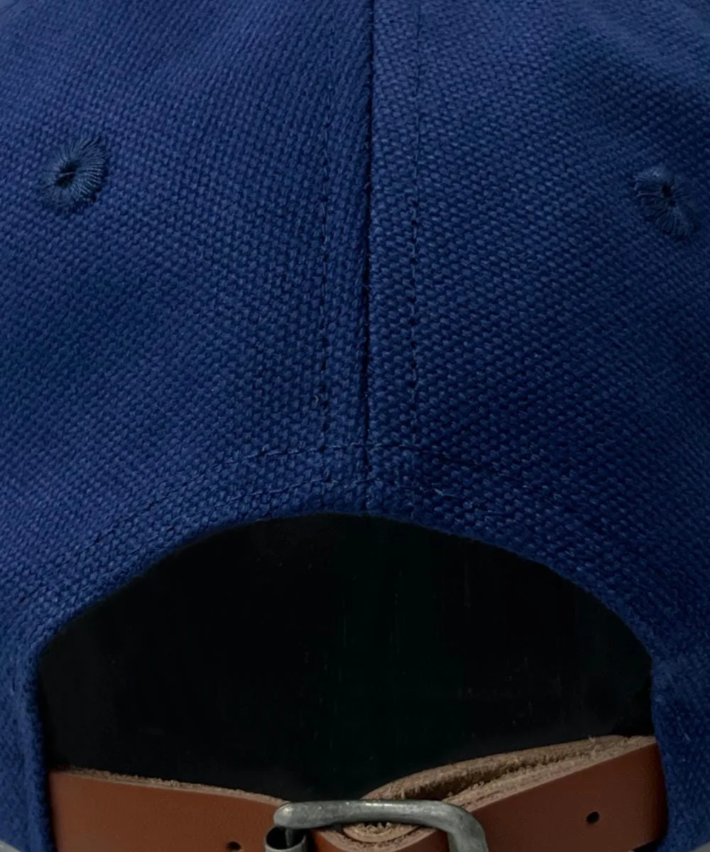 SCHOFIELD UFO PATCH CAP BACK A photo of the Schofield UFO cap back fastening strap made of leather with a black buckle