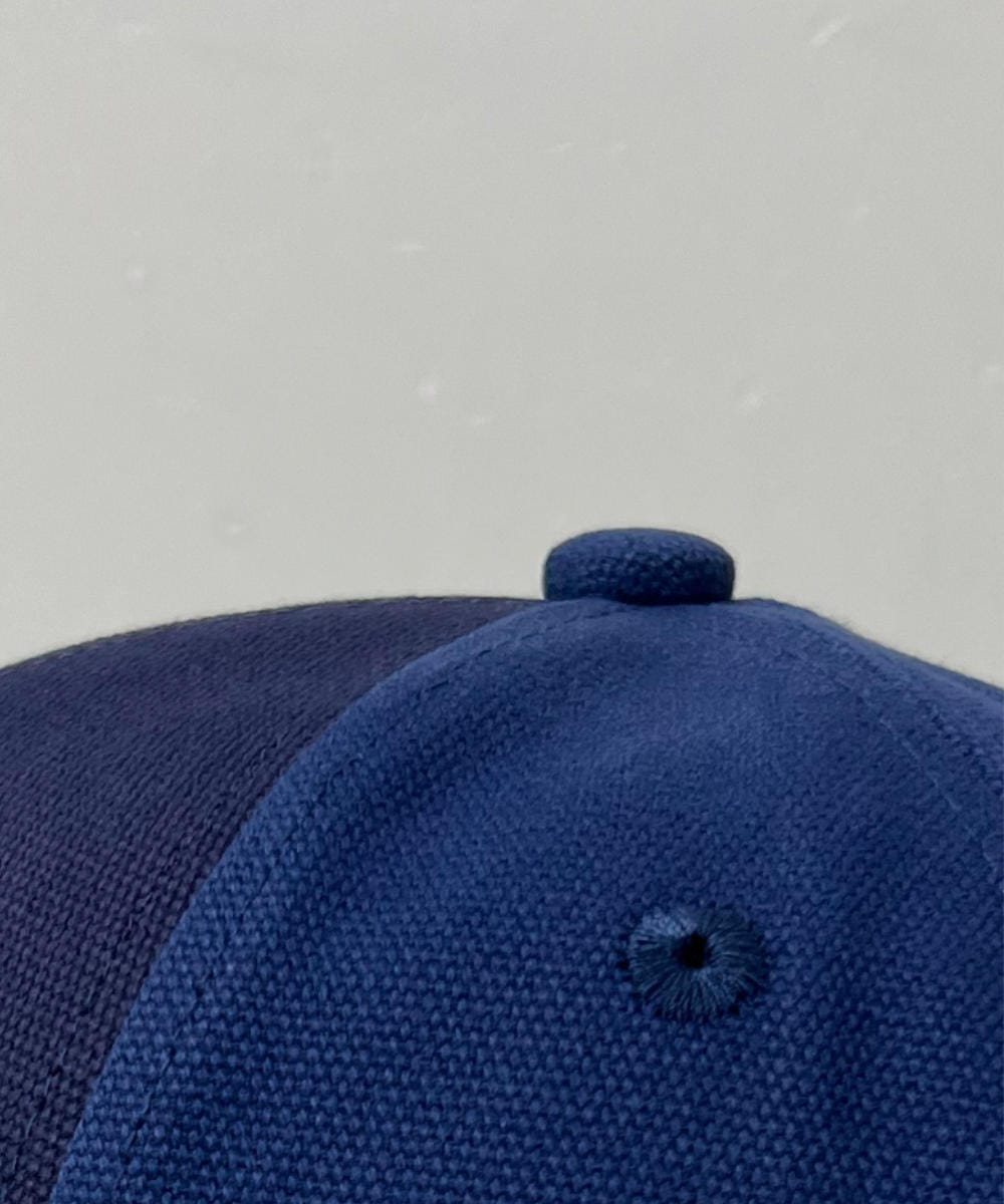 A Schofield blue cap