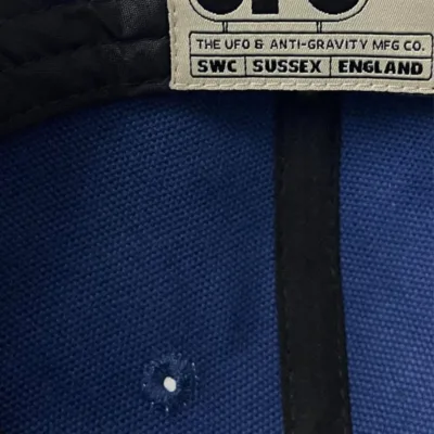 SCHOFIELD UFO PATCH CAP INSIDE SCHOFIELD UFO PATCH CAP INSIDE, an indigo baseball cap