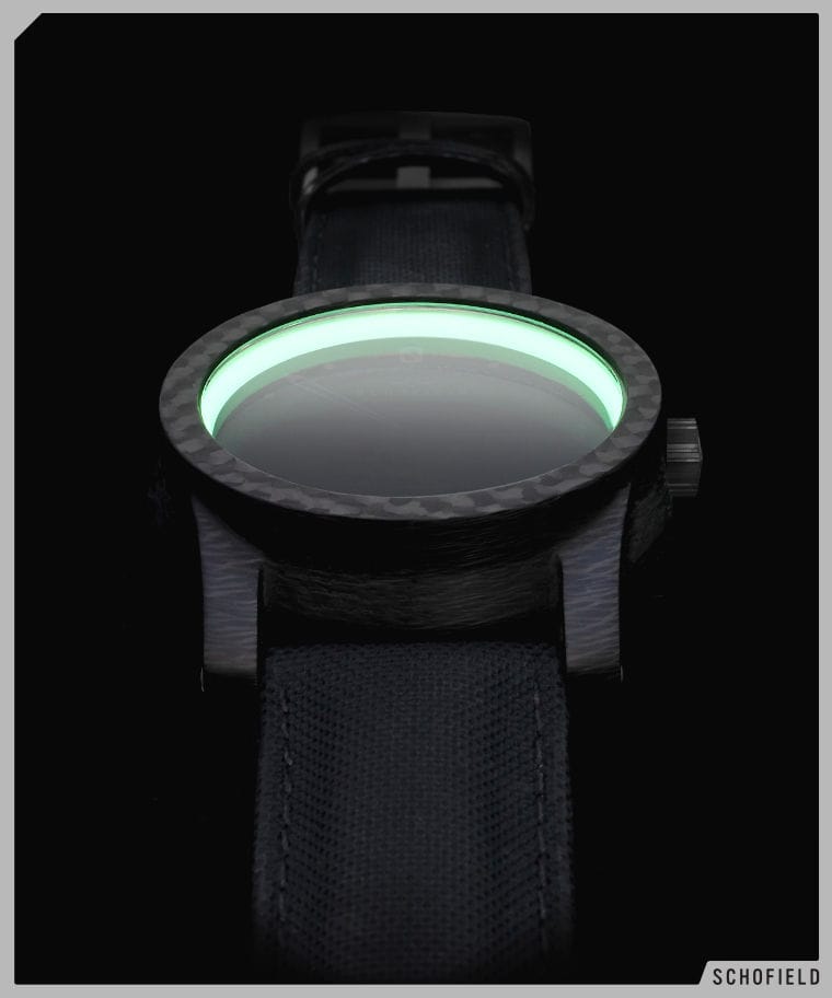 A Schofield carbon fibre watch called the Blacklamp with Moonglow ring