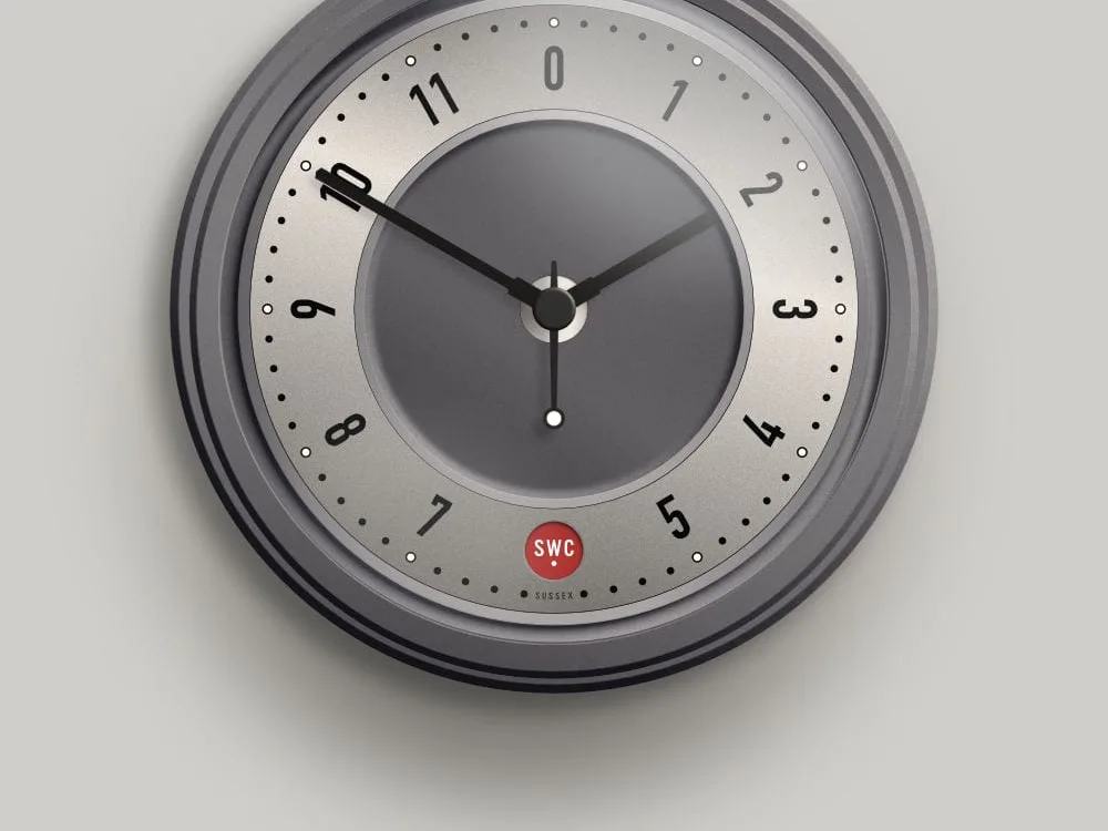 Small wall clock with silver dial