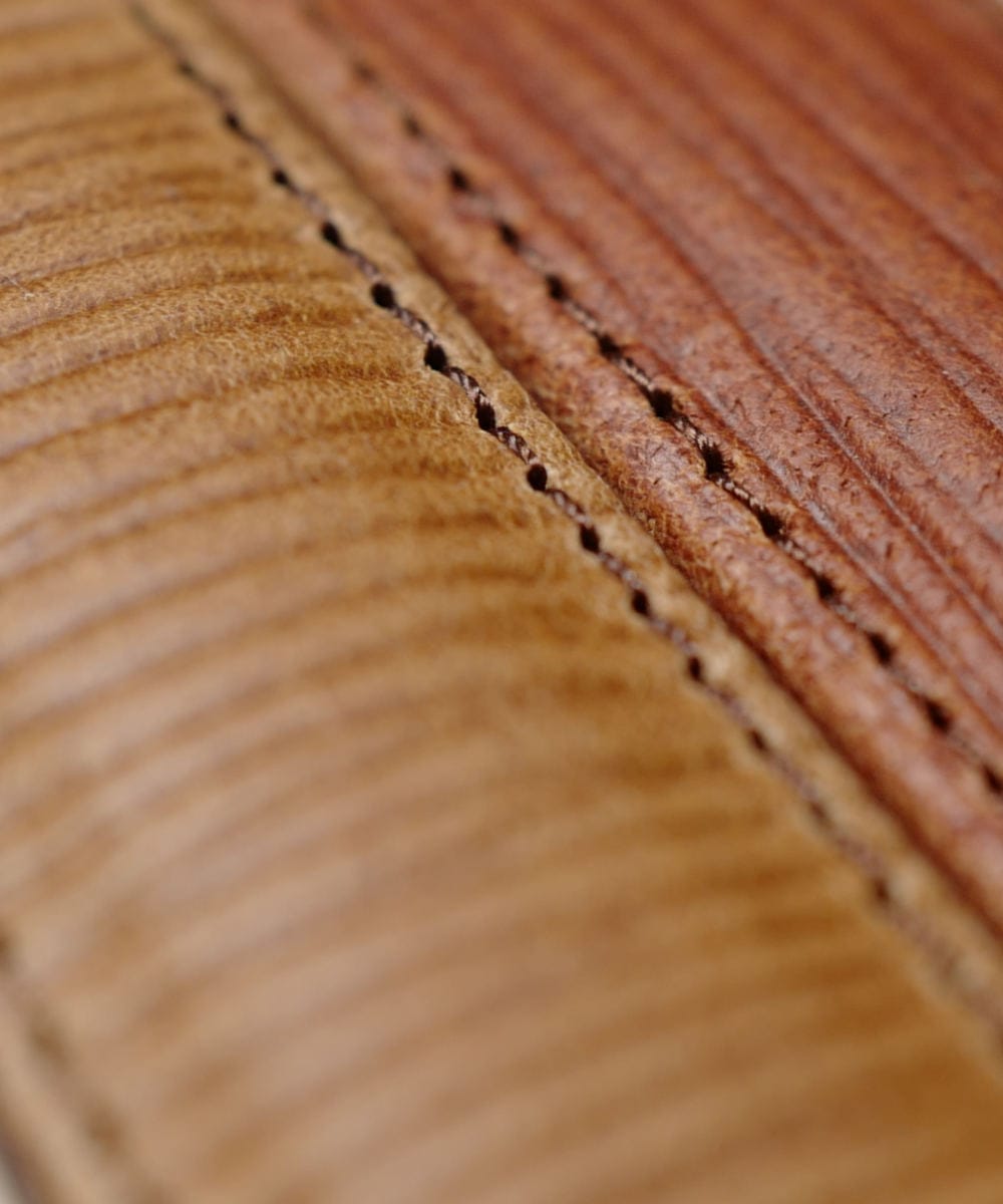 Tan and brown textured straps