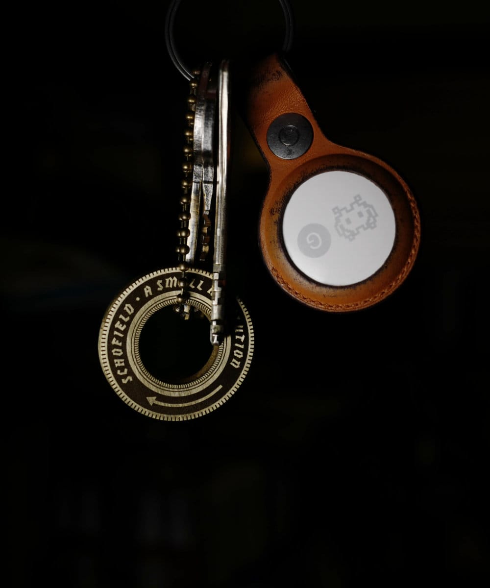 An old racing tyre brass keyring