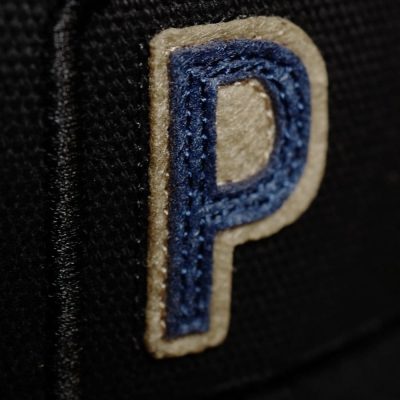 Close up of the felt patch letter P for PIPS