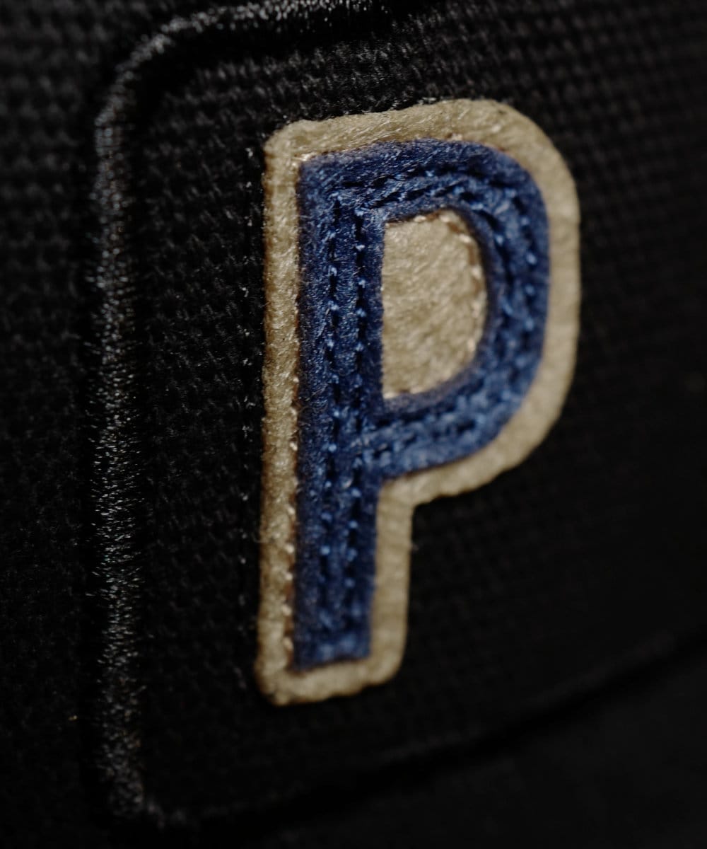 Close up of the felt patch letter P for PIPS