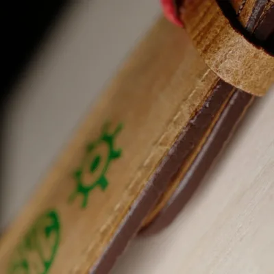 Side view of tinted edges on the Schofield leather watch strap. Like tree bark.
