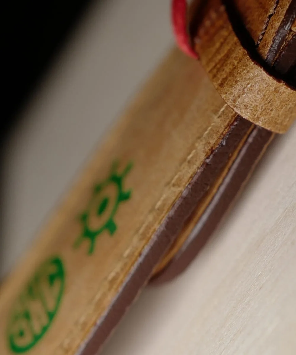 Side view of tinted edges on the Schofield leather watch strap. Like tree bark.