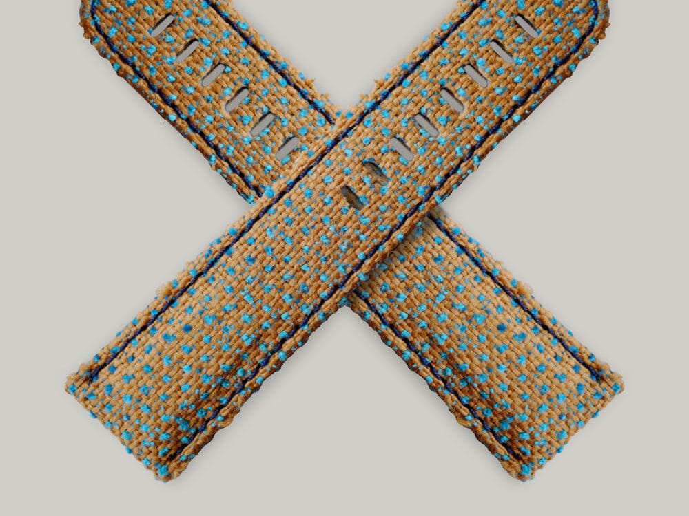 Schofield image in a cross shape of the electric wicker Chenille strap, brown with blue dots