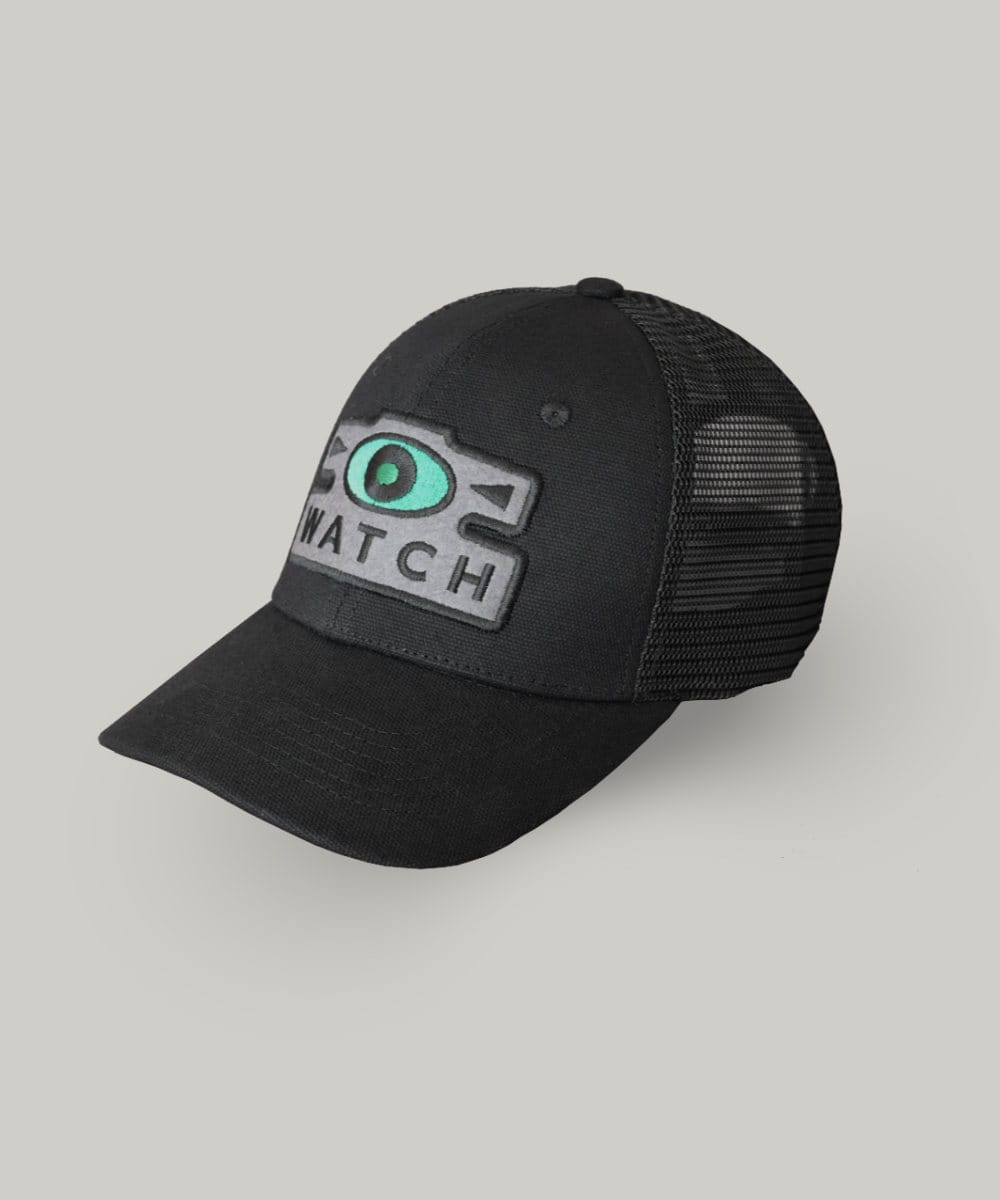 Schofield black cap with watch patch and a single seeing eye