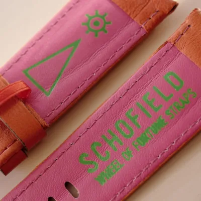 Reverser for Schofield Strap Reverse of the tomato lambskin strap with a vivid pink leather lining