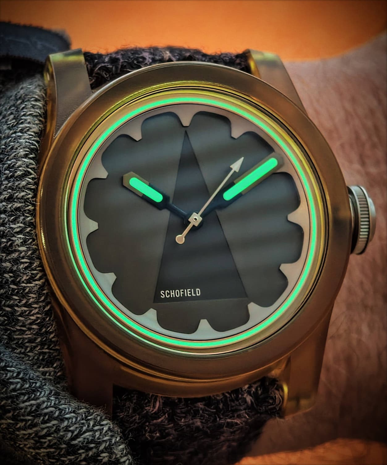 Schofield Skeptiko artefacts on wrist with loom showing 