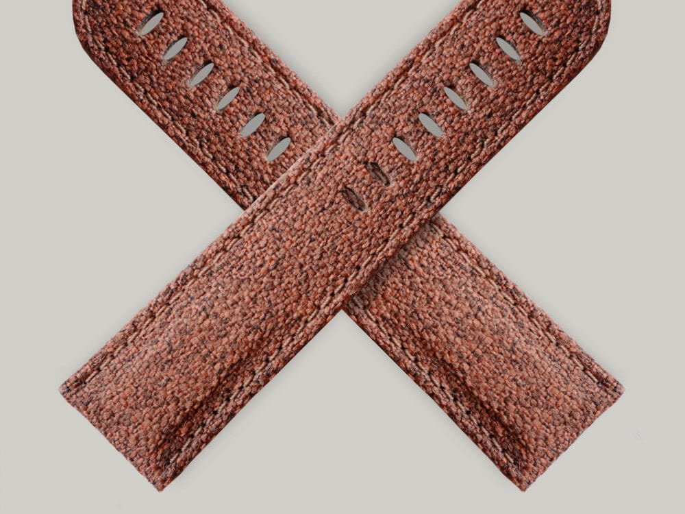 Carpet bag strap A brown watch strap that looks like a carpet bag