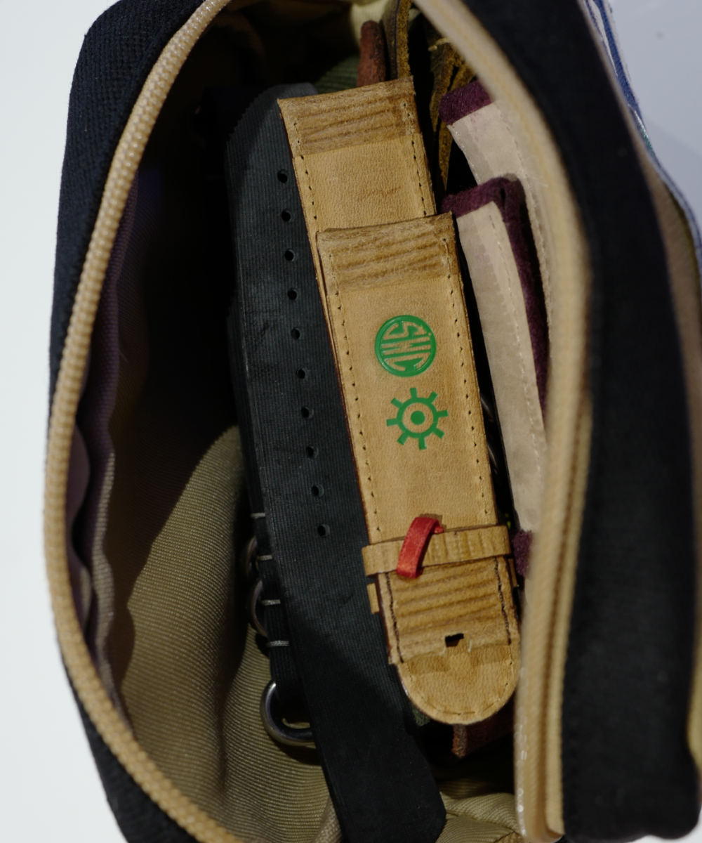 Watch pouch full of straps The inside of a Schofield watch pouch full of straps