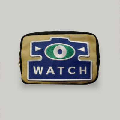 Schofield watch pouch A canvas pouch for storing straps and watches, with a blue watch patch on the front
