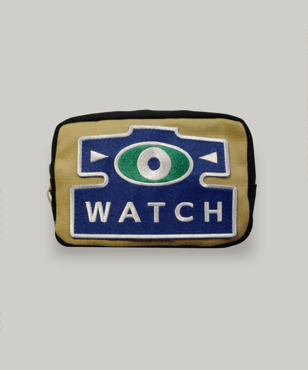 A canvas pouch for storing straps and watches, with a blue watch patch on the front